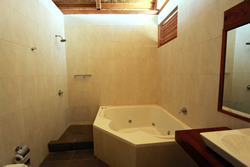 The Sun house has built in jacuzzi bath to relax in at the end of a long day surfing